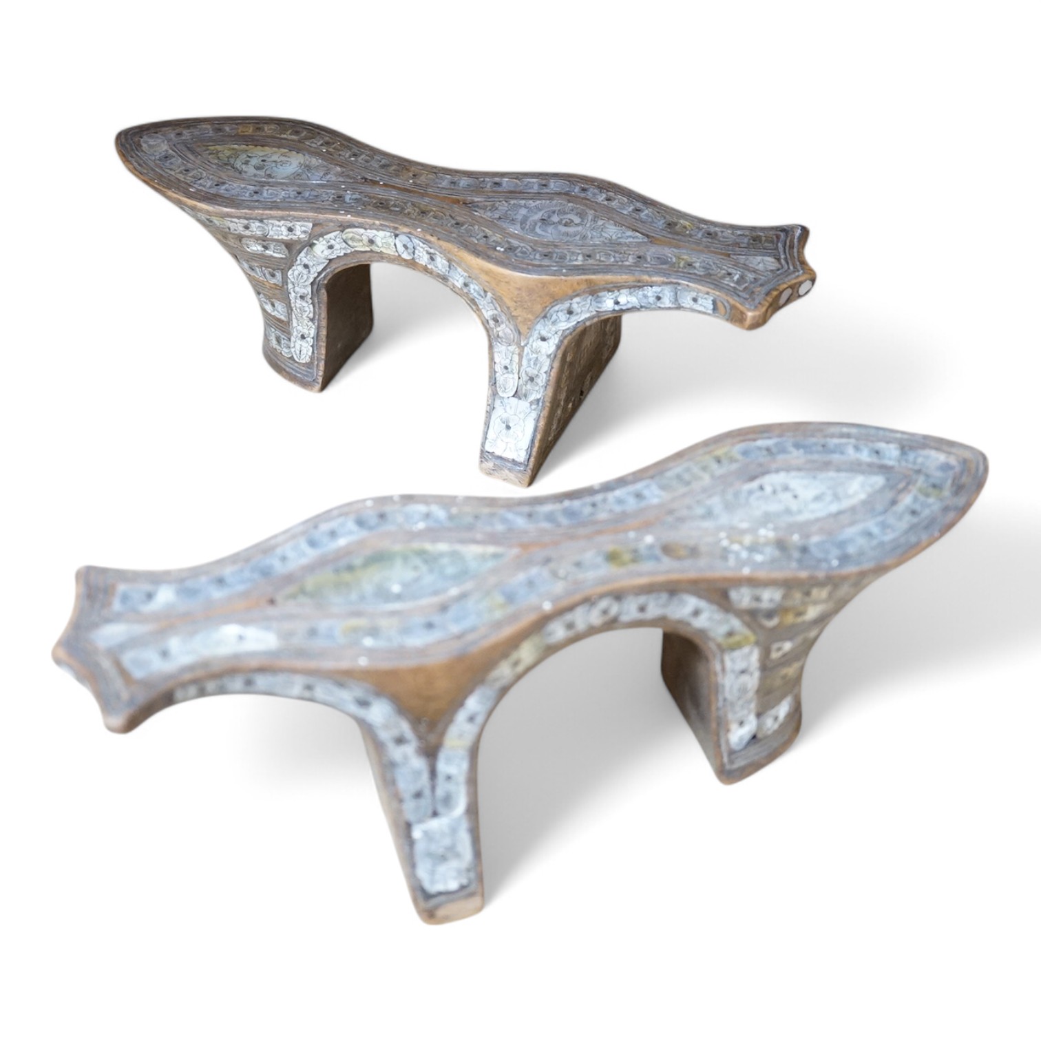 A pair of Islamic wood and engraved mother-of-pearl qabqab (shoes), 25cm wide. Condition - some losses